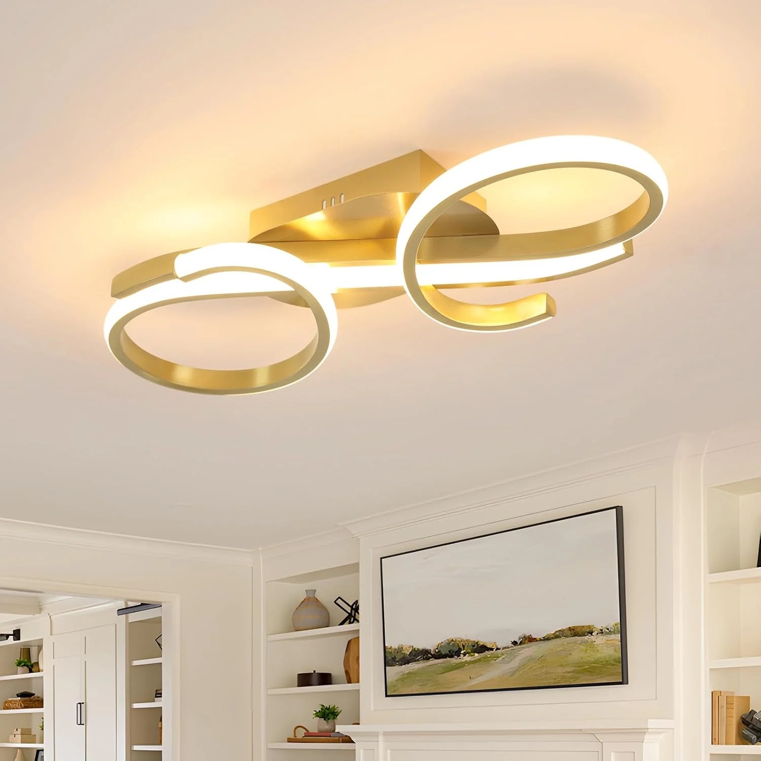 Gold double-ring LED ceiling light installed in a living room